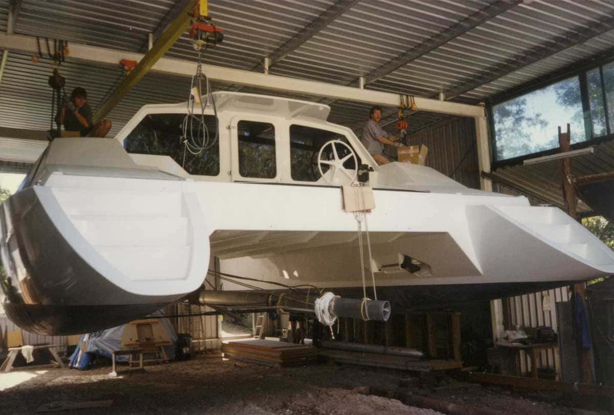 Boat hanging from chain blocks